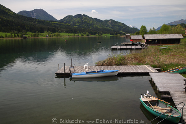 Weissensee Wasserlandschaft Ufer Stegs Boote Bergblick