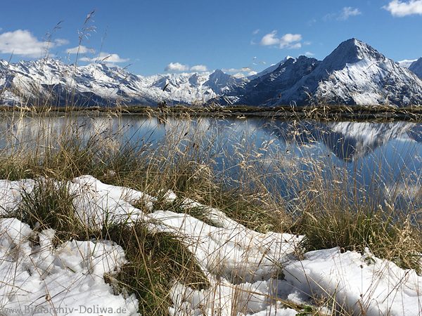 Alpensee in Schnee Ufergrser Berggipfel Zillertal Hochgebirge romantische Naturbild Winterfoto