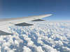 bd_flug737_ USA Flug über Wolken nach Übersee, Luftreise mit Flugzeug über Wolkenmeer in Luftbild