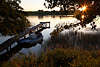 1103597_Seeuferromantik Naturfotos am Wassersteg: Frau im Boot, Sonnenuntergang Sterne in Bltter
