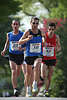 Marathonfoto Lufertrio Sportbild: Antonio, Jose & Mohamed auf Laufstrecke vor Alsterbumen