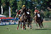 Polo-Chukker rennende Pferde Reiter mit Stick am Ball Polomatch Aktion in Galopp