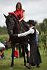 000470_Reitschule auf Friesenpferd, Mdchen Reitereischau Bild Reitkunst auf schwarzem Barockpferd