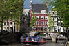 Amsterdam Gracht Schiff Frhling-Tour Bogenbrcke Altstadt Huser Foto