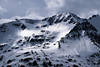 Bergfelsen im Schnee Lichteinfall Wolkennebel Foto von Hochalpenstrae