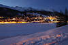 St.Moritz Skyline nchtliche Lichter Panorama Winterlandschaft Nachtfoto See in Schnee